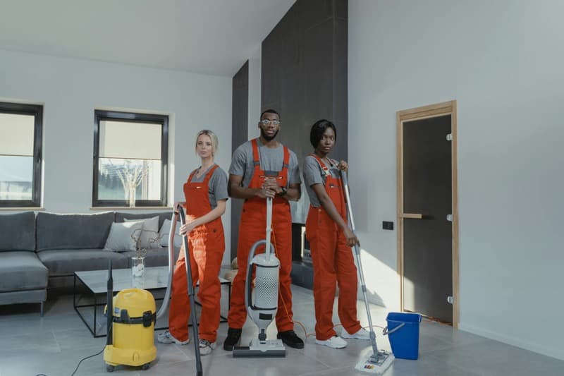 homeowner reviewing cleaning service contract and insurance documents