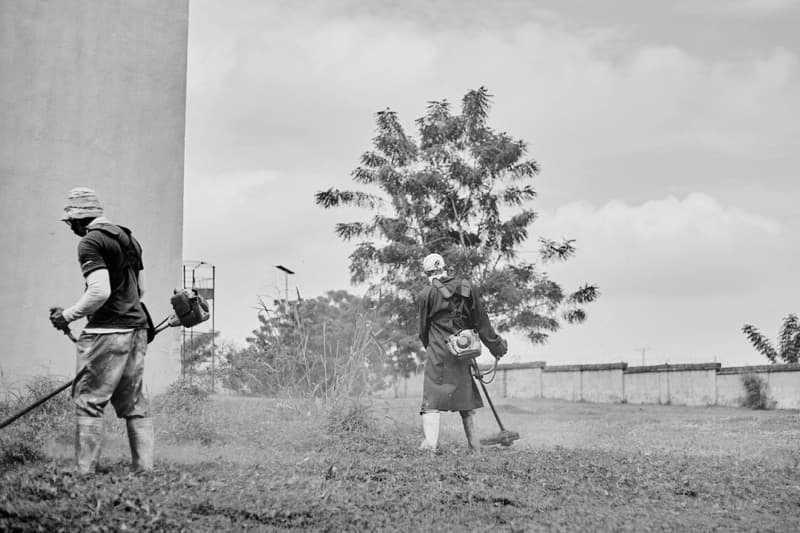 homeowner reviewing a landscaping project proposal with a contractor